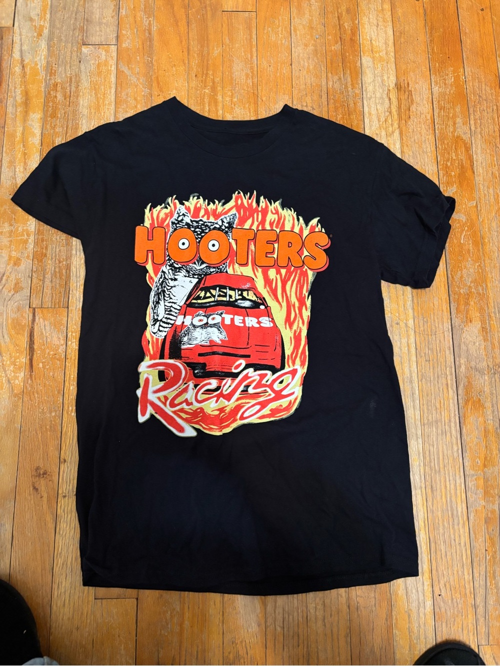 Hooters Black Tee with Orange Logo and Red Racing Car Graphic